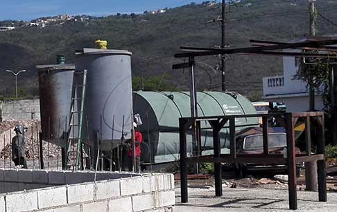 To install waste tire pyrolysis plant for Jamaica customers