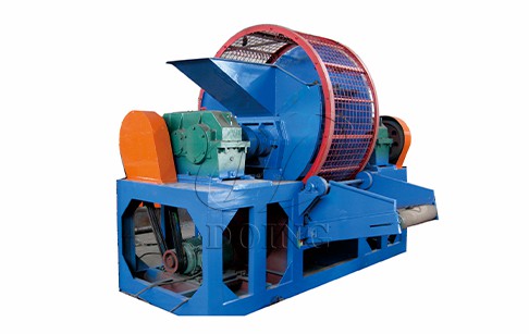 Tire cutting shredding machine